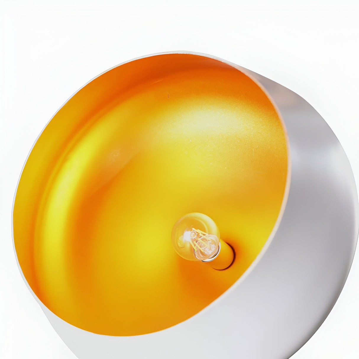 A close-up of the Funk Stout Small Pendant Light - White, showcasing its metallic white exterior, bright reflective gold interior, and central exposed bulb—perfect for modern spaces.