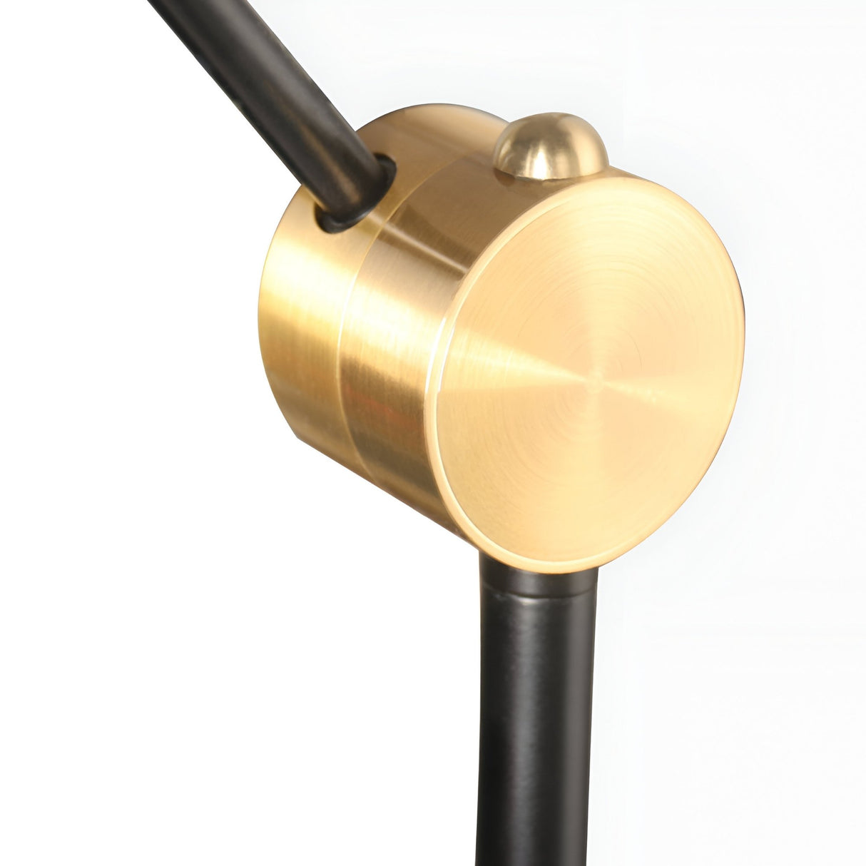 Close-up of the Funk Table Lamp - Black featuring a brushed gold cylindrical fixture, black metal arms, and a smooth round gold accent on top. Its adjustable head offers versatility, making it ideal for modern decor. Set against a plain white background.