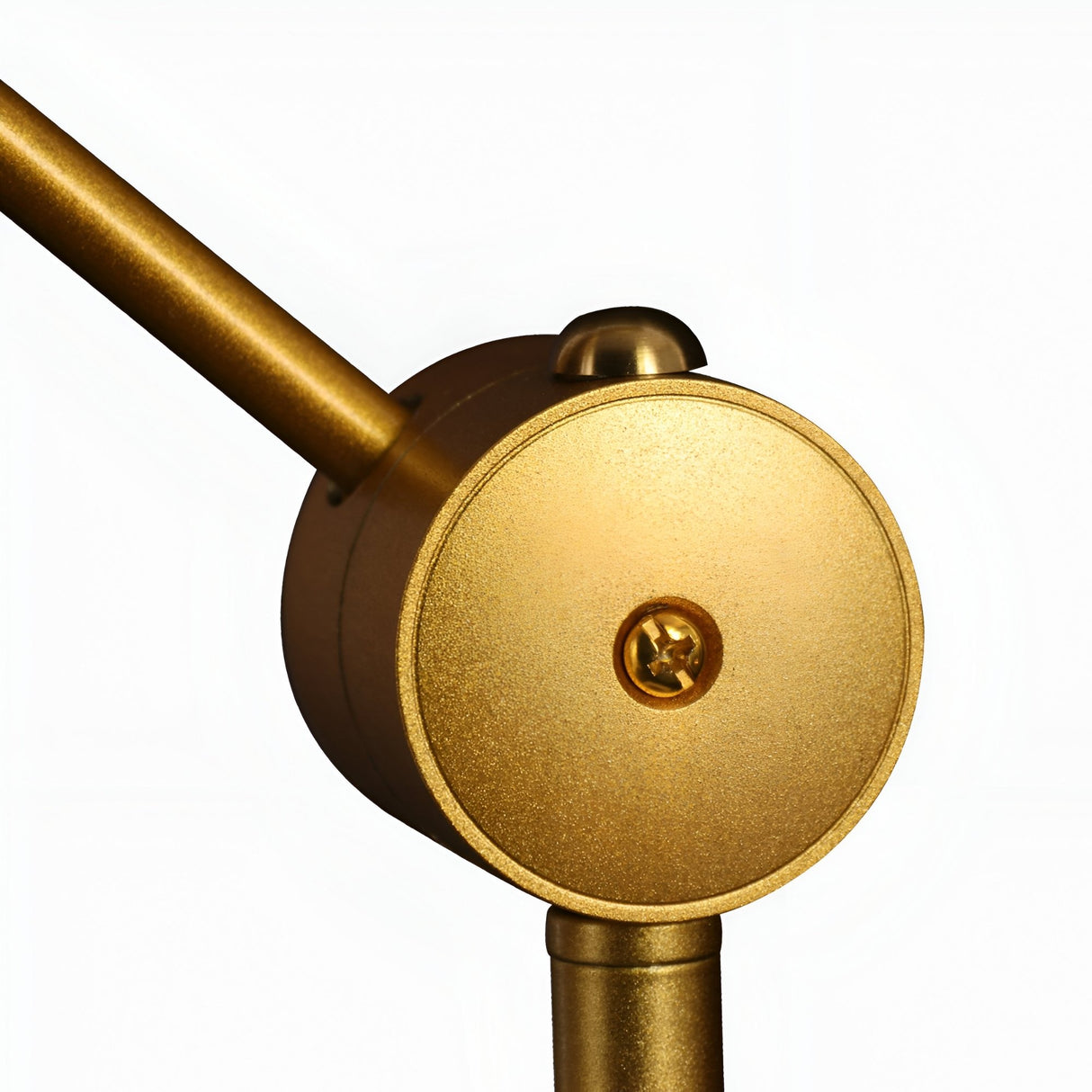 Close-up of the Funk Table Lamp - Brass highlights its minimalist design with a gold metallic circular joint, adjustable head, and twin cylindrical rods against a white background.