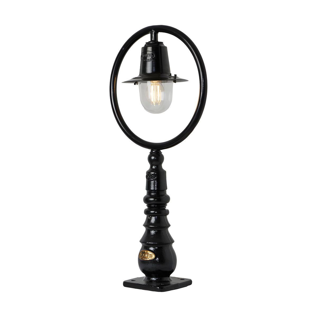 Small black cast iron Railway Style pedestal post light with a hoop frame, spun shade, clear glass dome, and column base with square mounting plate.