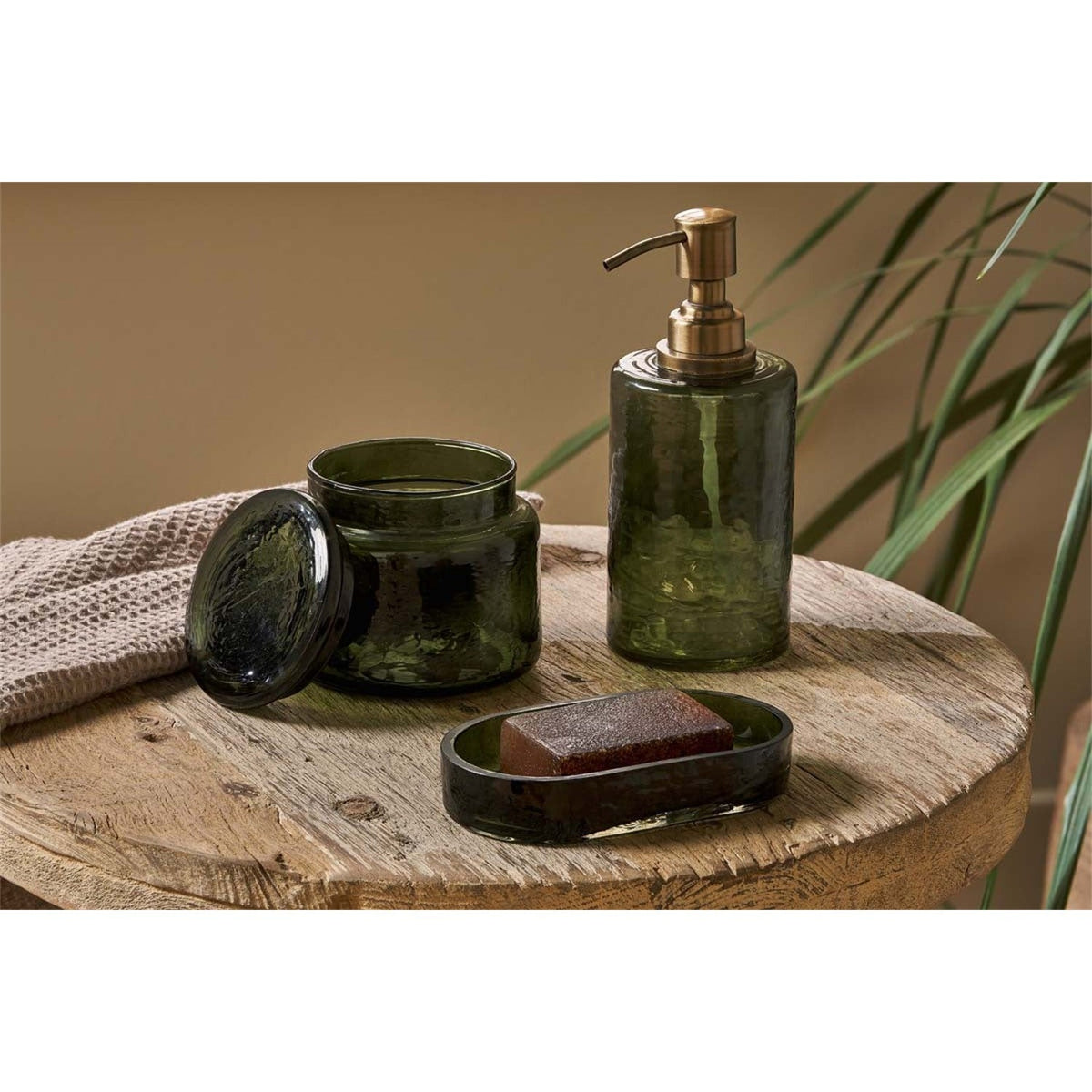 Ilcoso Recycled Hammered Glass Storage Pot - Green in a bathroom, view 5