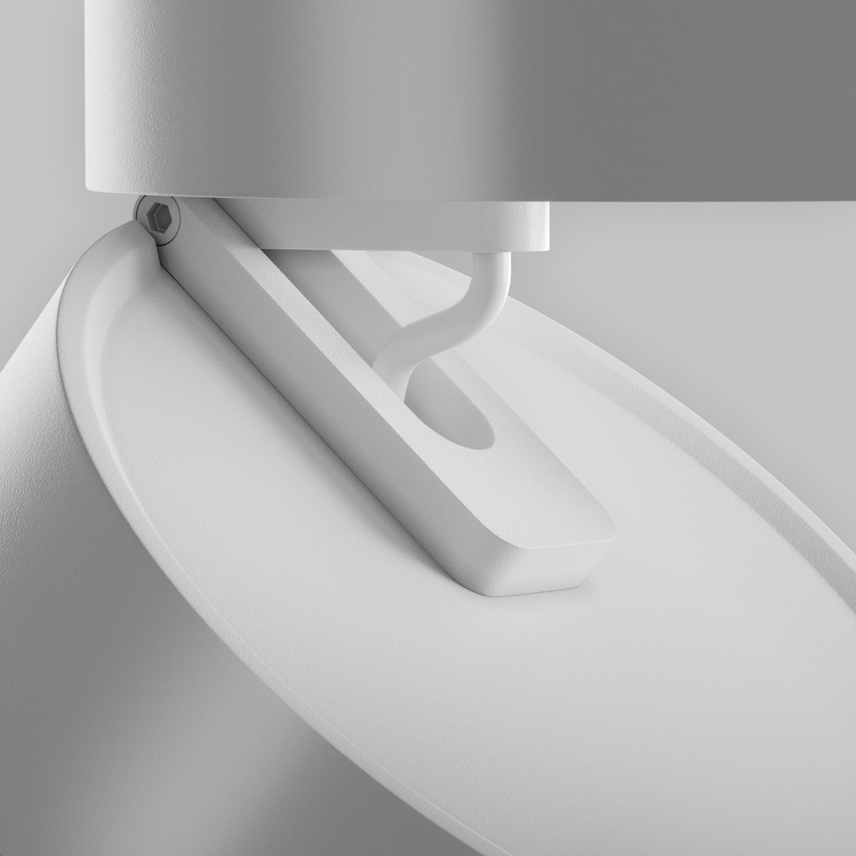Close-up of the Onda LED Single Spotlight 18W 3000K in white with a modern geometric design. The focus is on its sleek, adjustable head and smooth surfaces, emitting warm light against a light gray background.