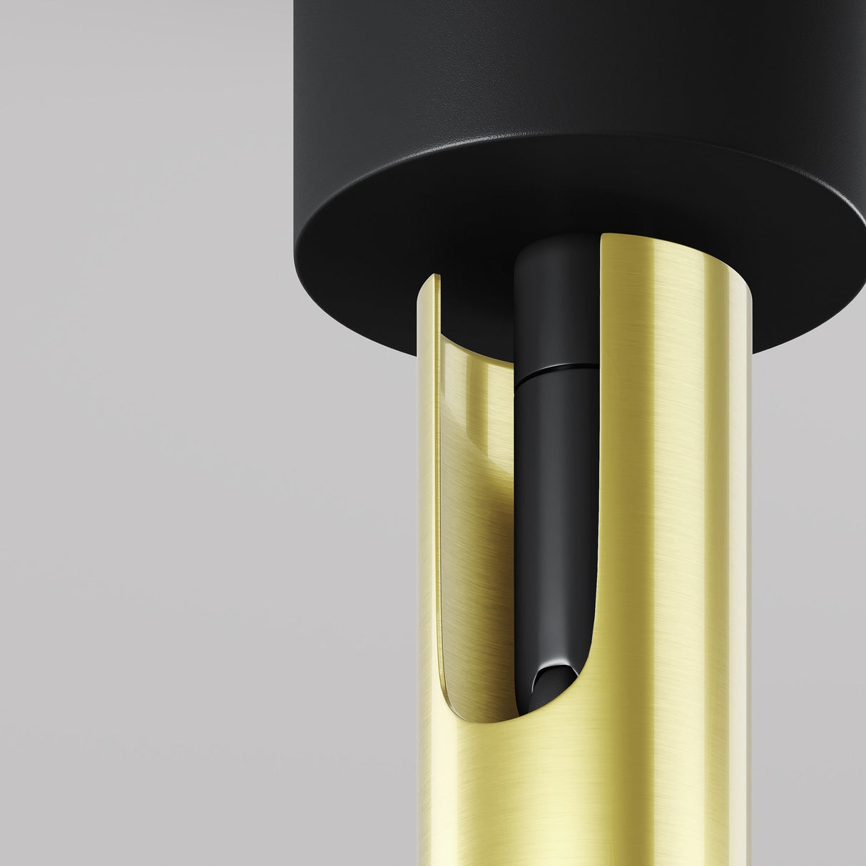 The Focus T LED Short Single Spotlight 6W 3000K features a sleek design with a black cylindrical top and gold brass support. Its energy-efficient LED component is visible through a vertical opening against a neutral gray background.