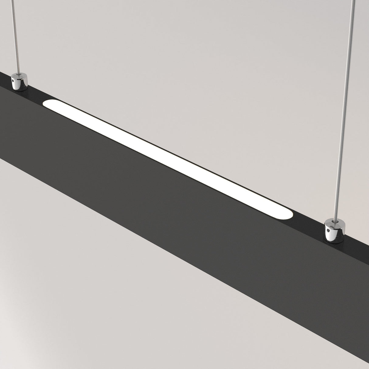 The Step LED Linear Suspension Light 4000K 30W - Black features a modern rectangular design with a central narrow white light strip. Hanging from the ceiling by two adjustable cables, it offers energy-efficient lighting ideal for sleek and minimalist modern office settings.