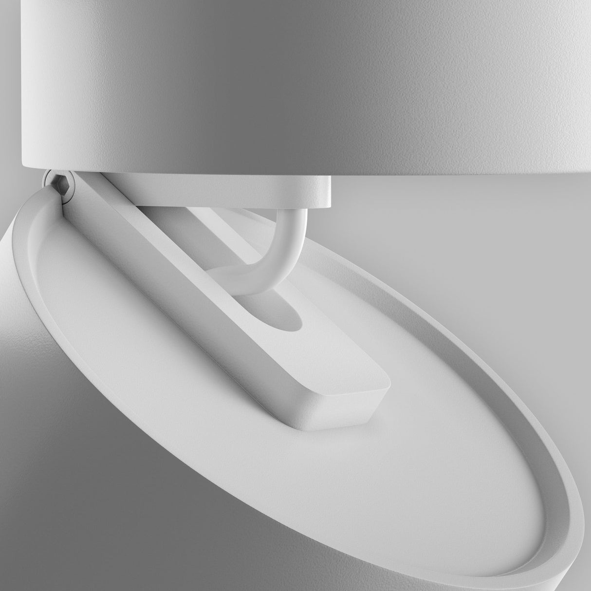 Close-up of the Onda LED Single Phase Unity Track Spotlight (12W, 3000K, White), featuring sleek minimalist design. Focus on the curved section and attachment showcases a smooth matte finish with geometric aesthetics, as its LED spotlight emits a subtle warm white glow.