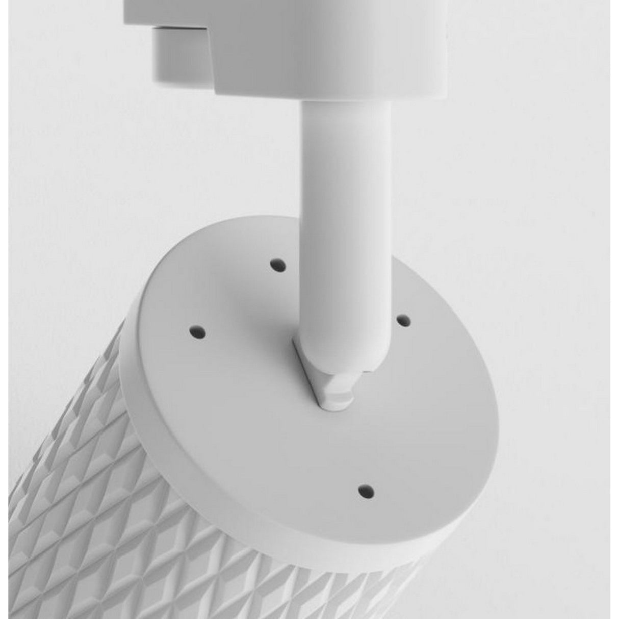 Close-up of a white, cylindrical microphone with a textured grip and an arm resembling an adjustable lighting setup, highlighting its minimalist design and attachment mechanism similar to the precision of the Focus Design Single Phase Unity Track Spotlight - White.