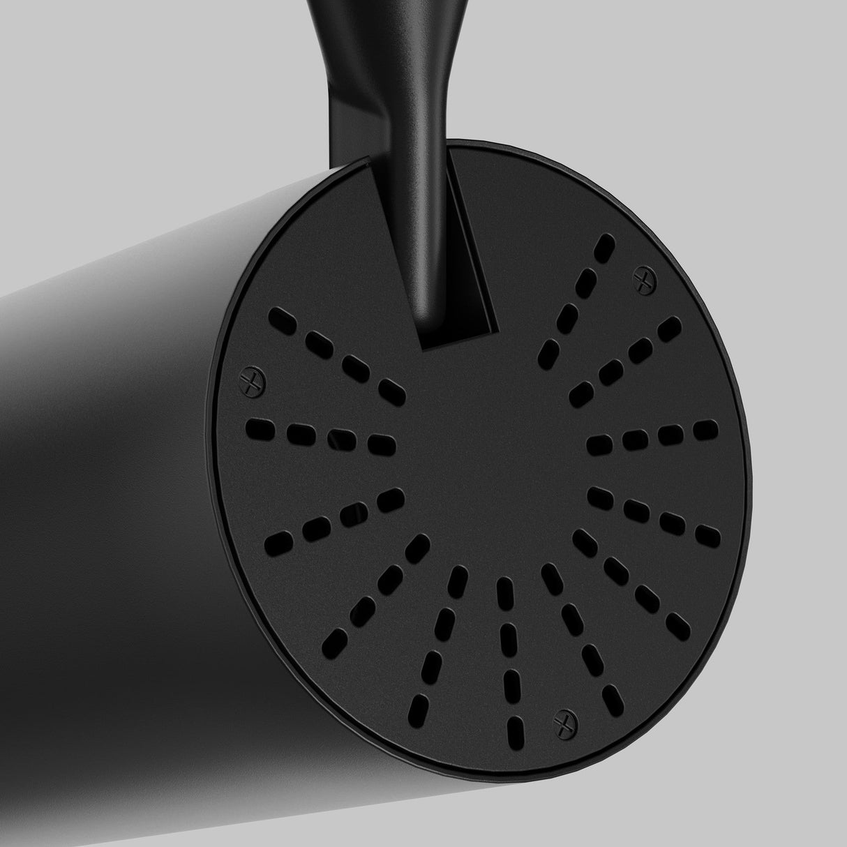 The Vuoro S 3-Circuit Trinity Track LED Spotlight 10W 4000K in black, with a sleek cylindrical design and perforated end, is captured at an angle against a light gray background. It features an adjustable swivel head for precise lighting.