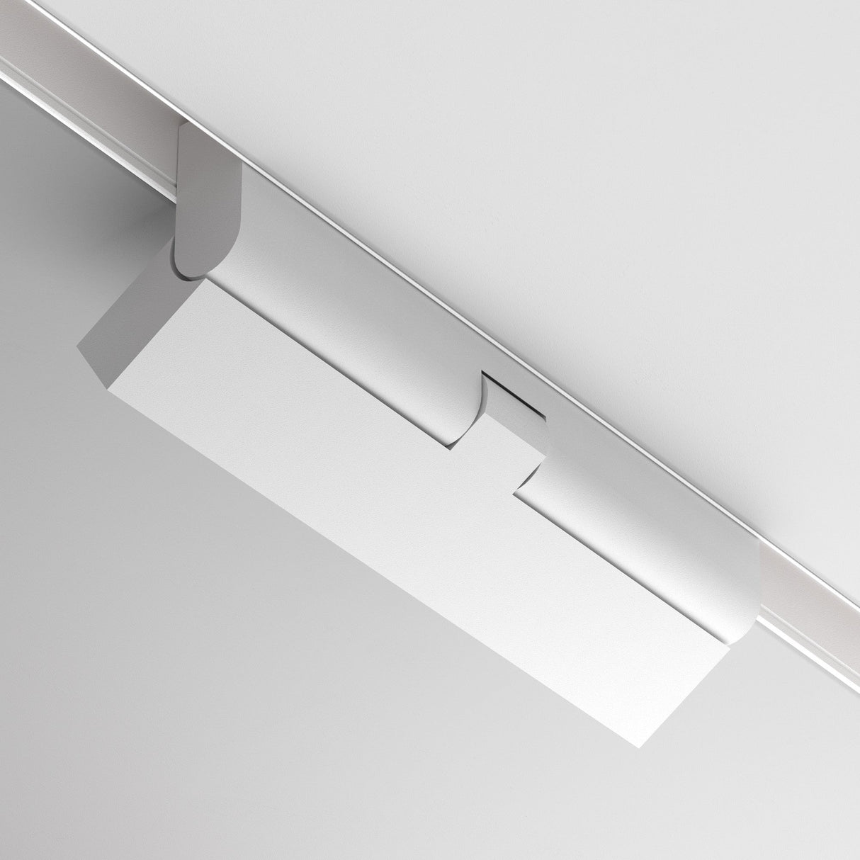 The Points Rot DALI CCT LED Linear Track Light in white boasts a sleek, rectangular design with a modern aesthetic. Its mounted on the ceiling and is DALI dimmable, offering adjustable color temperature from 2700K to 6000K for tailored lighting.