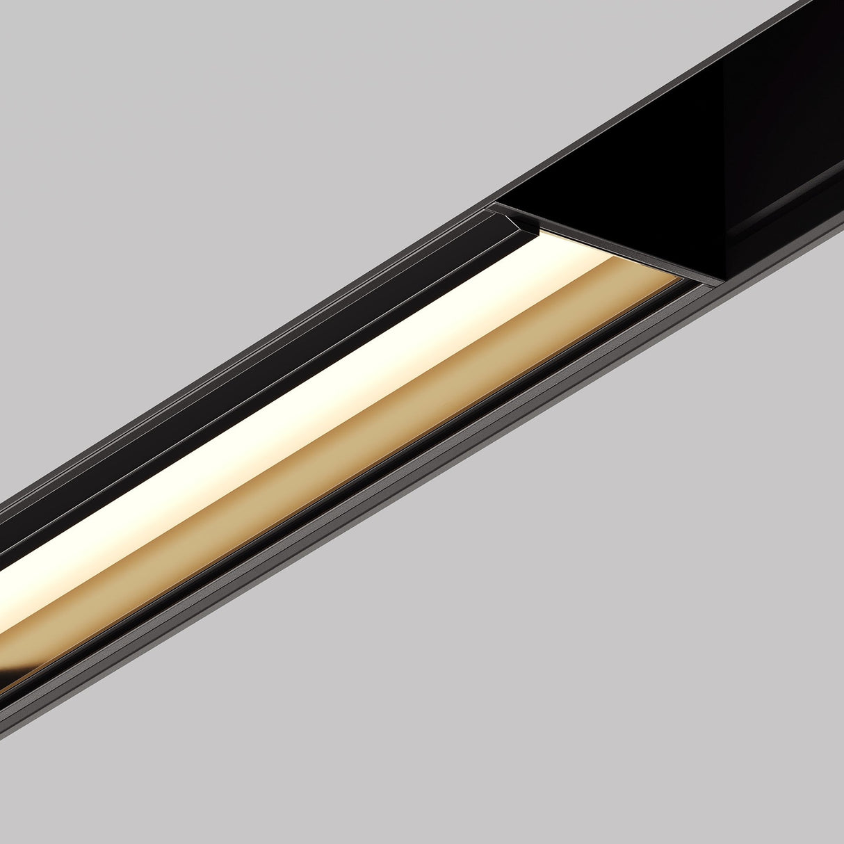 The Parete LED Linear Track Light for Magnetic Exility 12W 3000K - Black combines a modern elongated frame, warm white lighting, and sleek black design against light gray for an industrial yet energy-efficient touch to contemporary spaces.