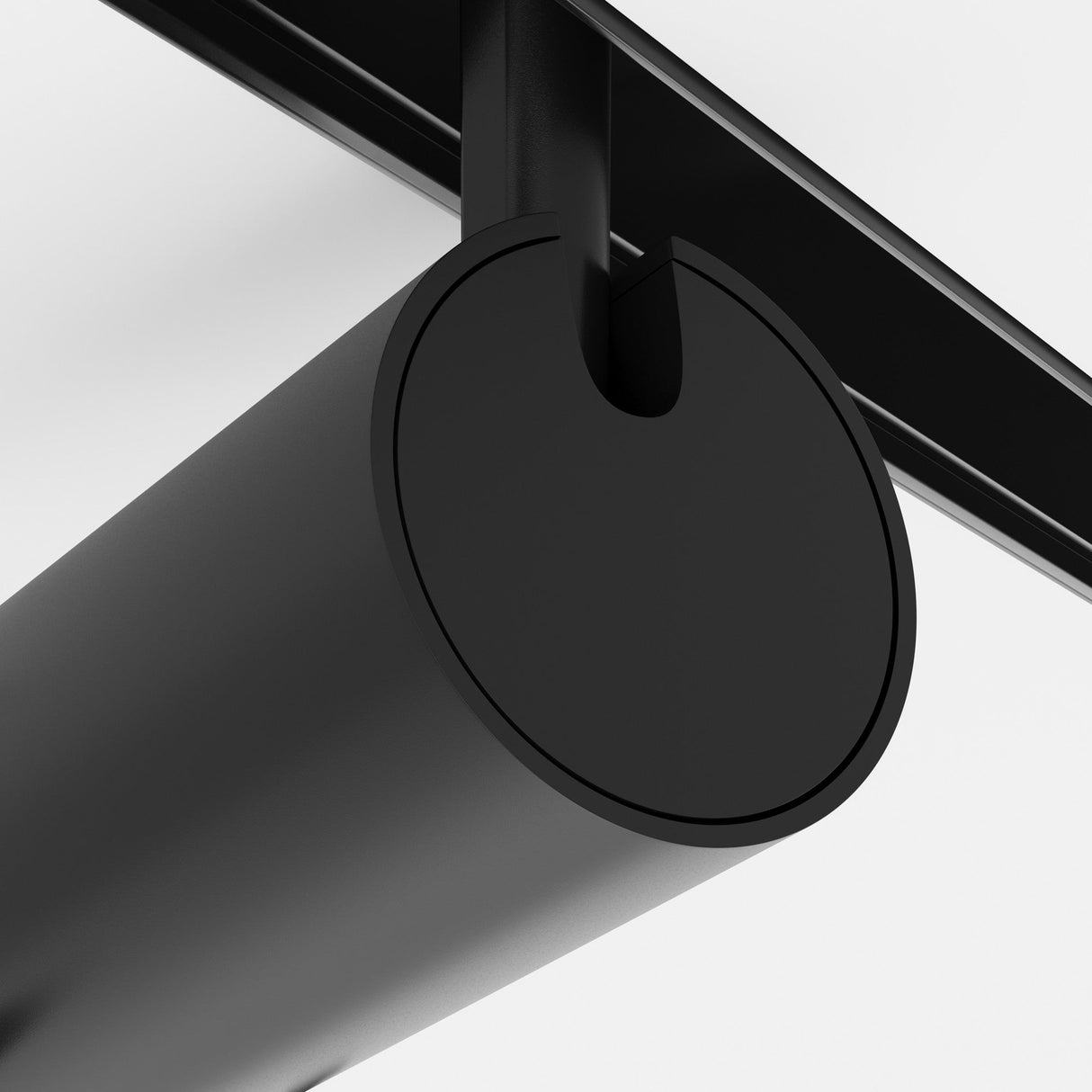 Close-up of a sleek, cylindrical black hanging light fixture on a white background. The modern design boasts clean lines and minimalistic aesthetics, enhanced by a Gala CCT Dimmable LED Magnetic Exility Track Spotlight in black connected to the ceiling mount.