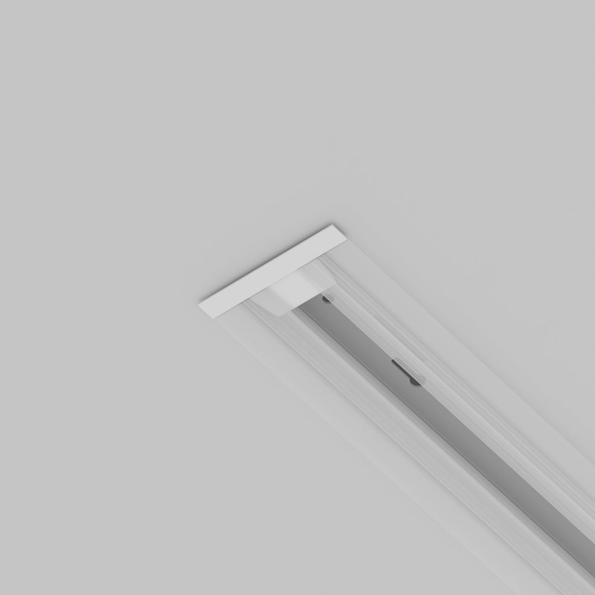 A close-up view of the Unity Tracks Single Phase Track End Cap in white against a plain, light gray background. The sleek rectangular design with clean lines complements minimalist decor, much like modern LED ceiling lights.