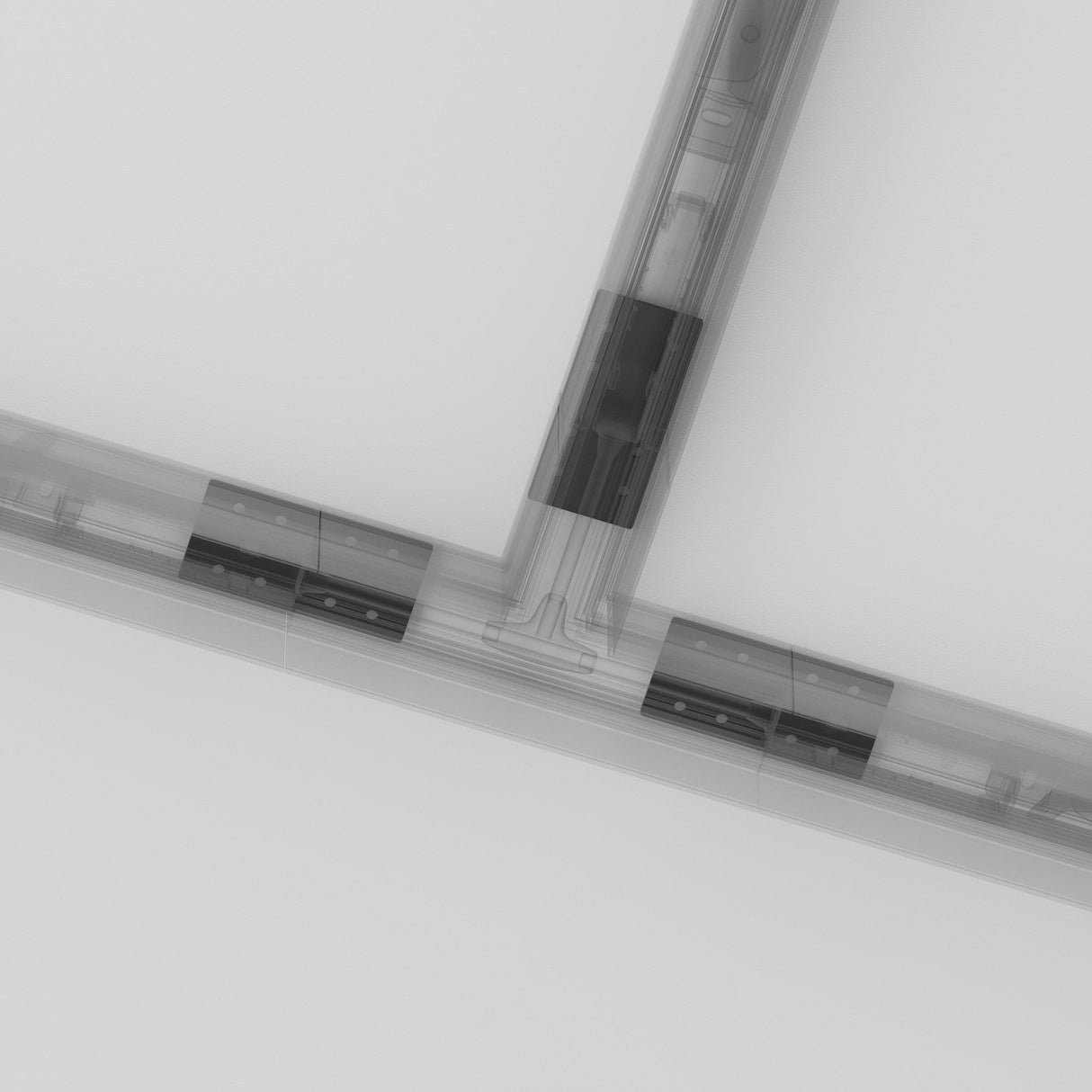 An X-ray view reveals the transparent L-shaped joint of the S35 Magnetic Track Straight Connector - Silver, showing visible inner components on a white background that highlight intricate mechanisms and precise alignments for flawlessly connecting metal parts.