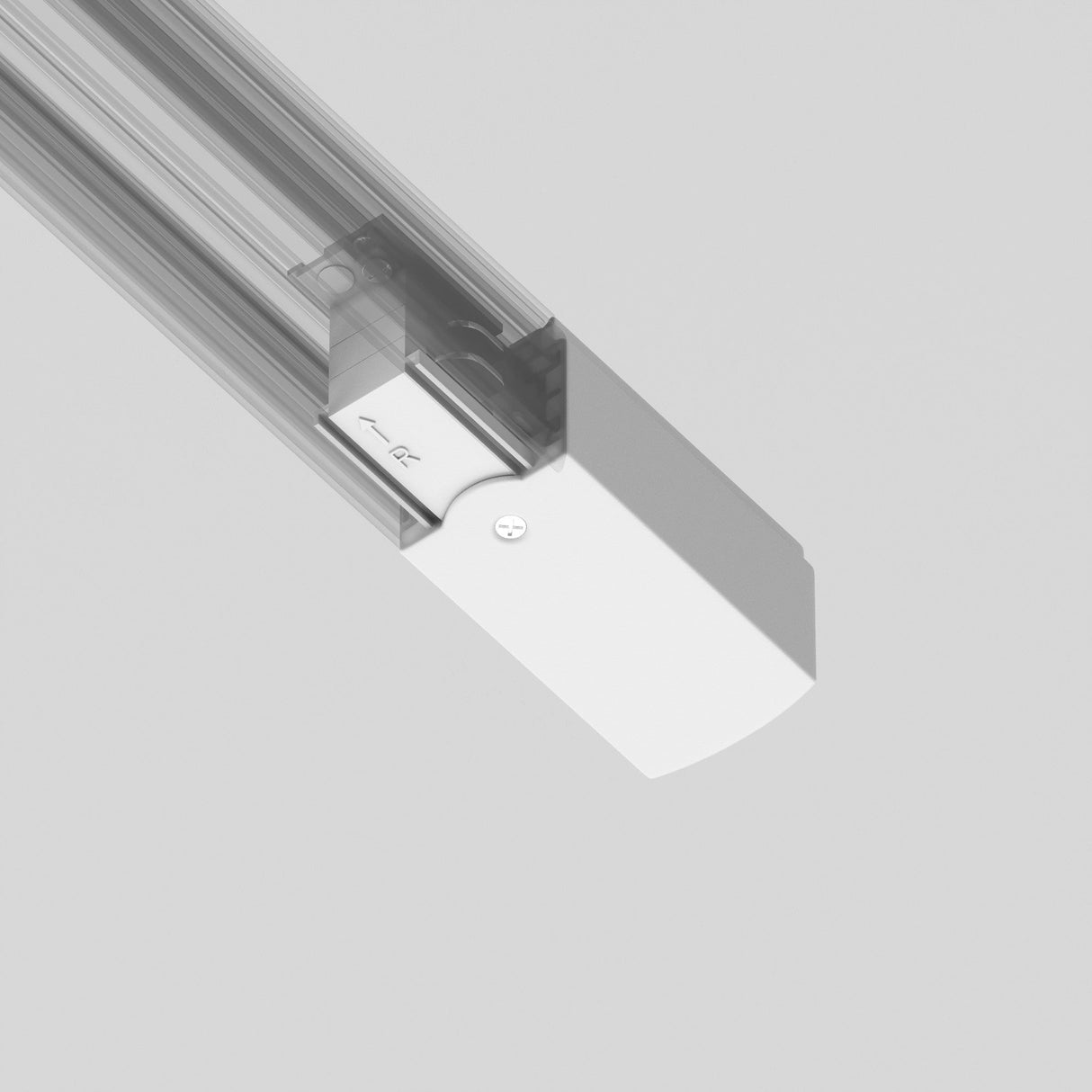 Close-up of the 3-Phase Track Trinity Right Power Input - White against a light gray background. With its sleek, modern design, visible screws, and seamless integration, it fits perfectly into any sophisticated lighting arrangement.