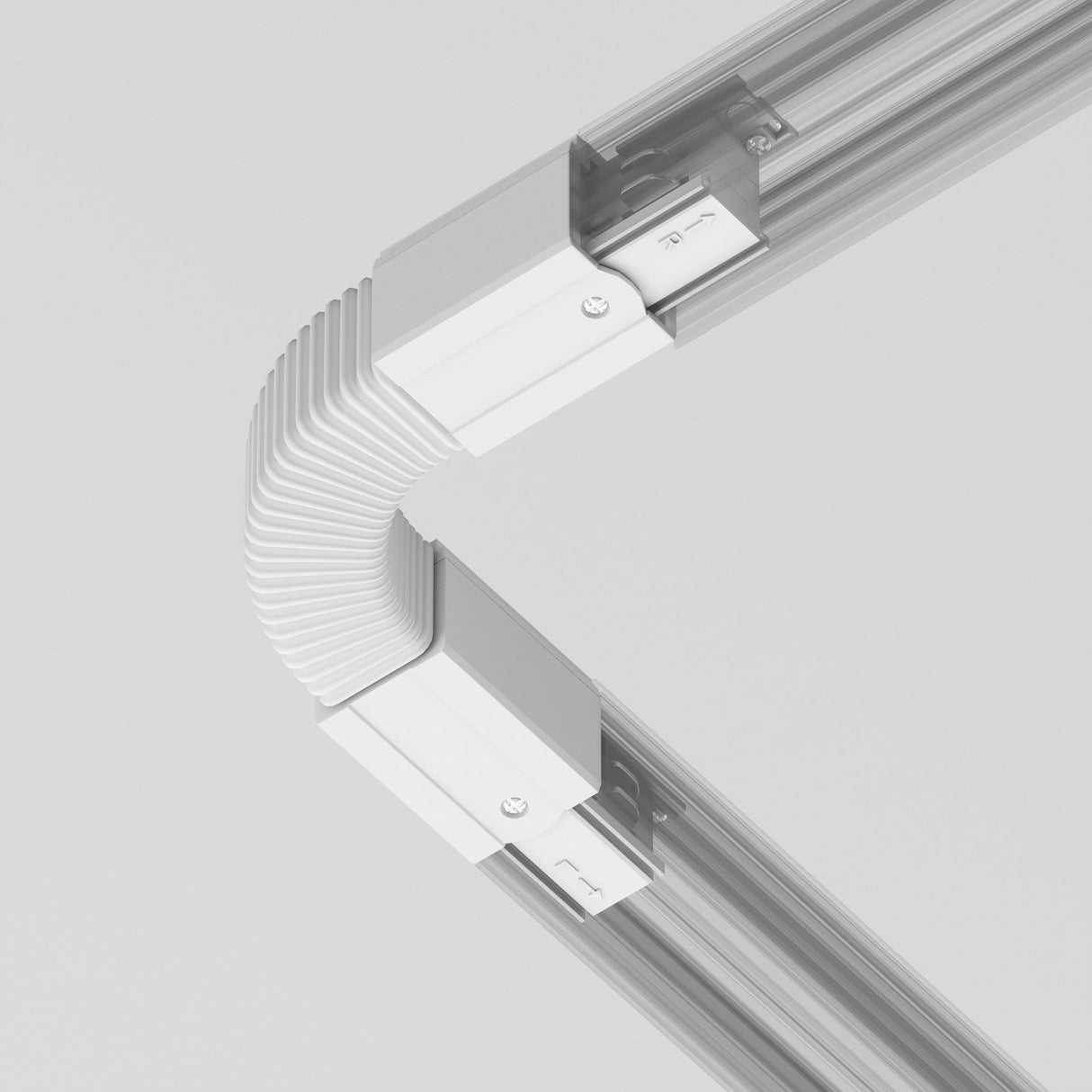 Close-up of the 3-Phase Surface-Mounted Track Trinity Flexible Connector in white, featuring an accordion-like joint connecting two metal rails at a right angle. It has visible screws and slots for precise adjustment, ideal for track lighting systems, on a light background.