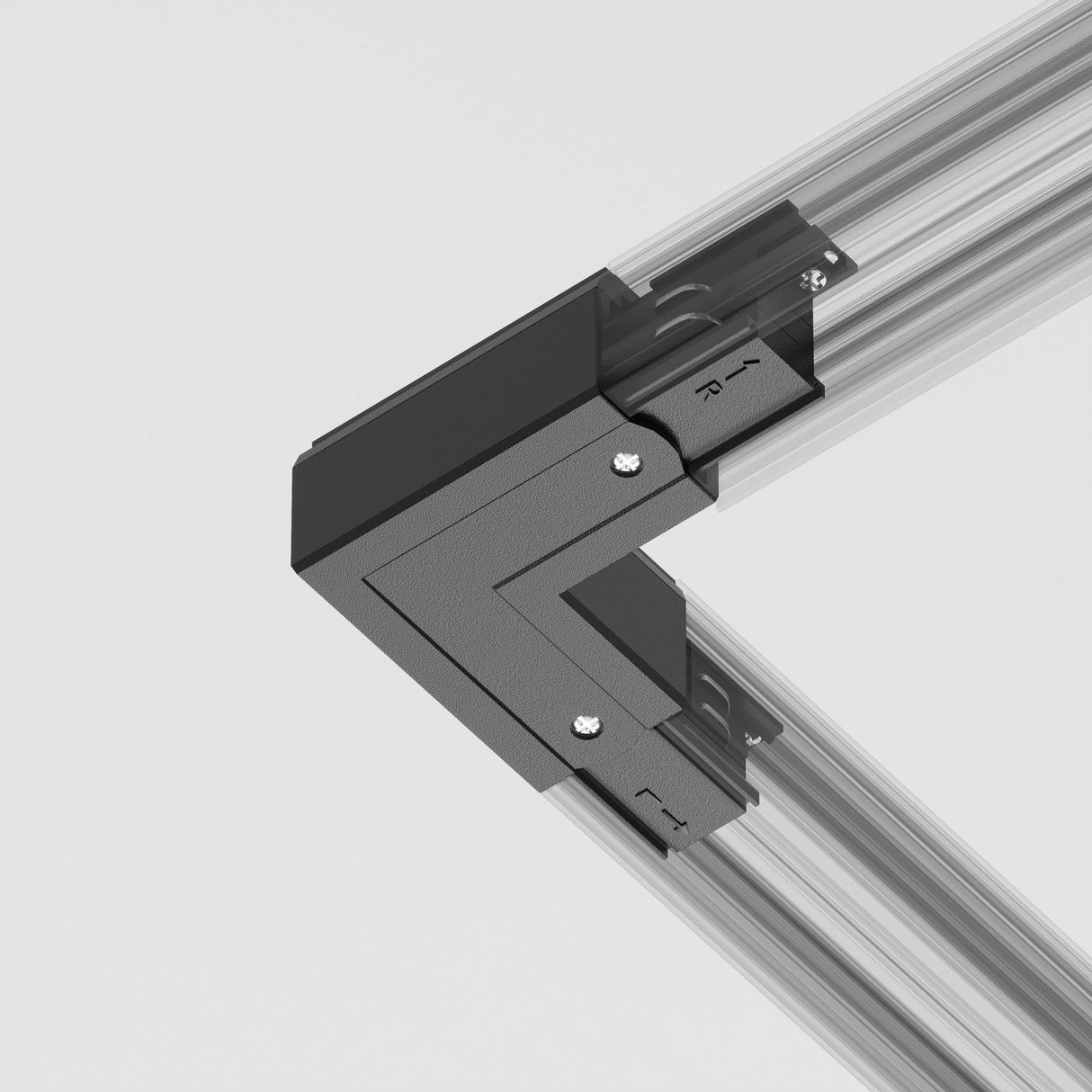 Close-up of a 3-Phase Surface-Mounted Track Trinity Internal Corner Connector in black, precisely uniting two aluminum profiles. Its sleek design and screws on a plain background offer flexible lighting configurations for contemporary needs.