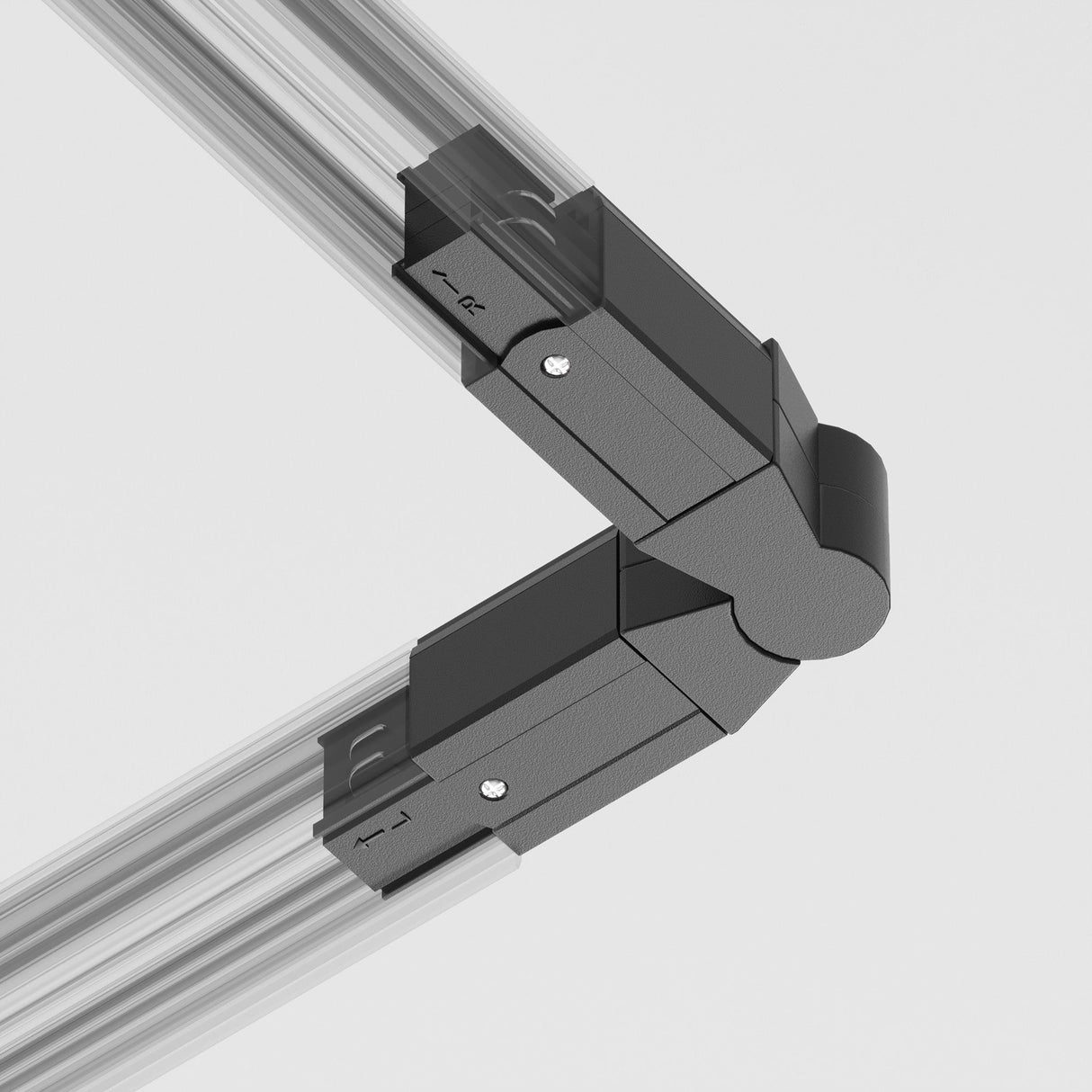Close-up of a 3-Phase Surface-Mounted Track Trinity Swivel Connector in black linking two metal or plastic rails at an angle against a white background, featuring visible screws, ideal for customized lighting configurations.