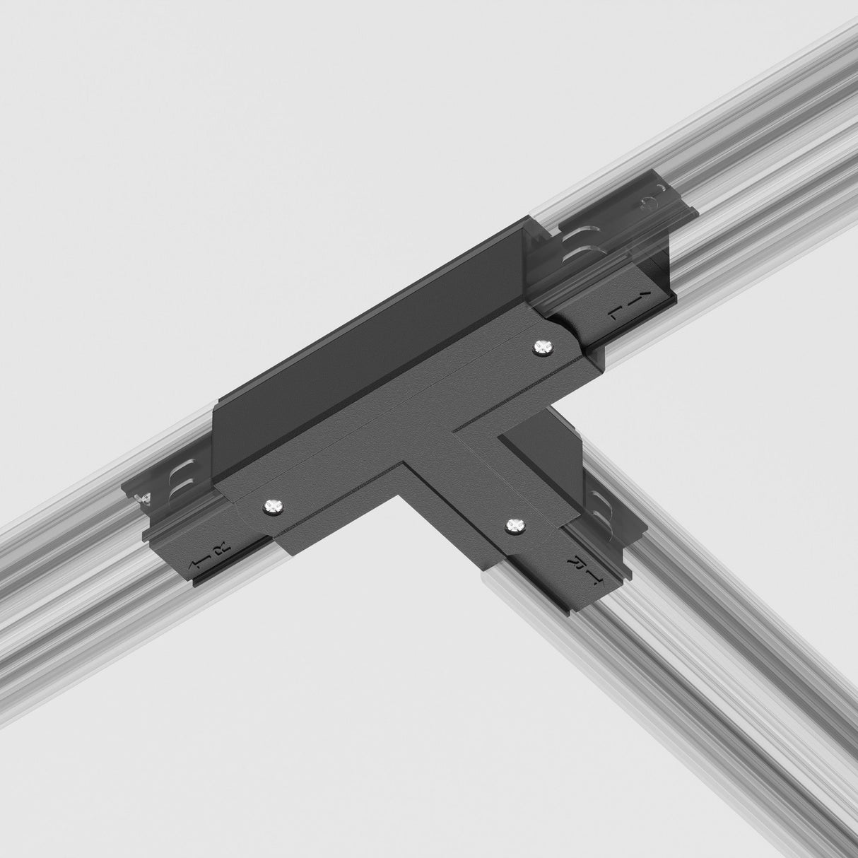 The 3-Phase Surface-Mounted Track Trinity Right T-Shaped Connector - Black is connected to three clear rods, creating an ideal T-junction for track lighting systems. The close-up image highlights its screws and metal structure against a light gray background for versatile lighting setups.