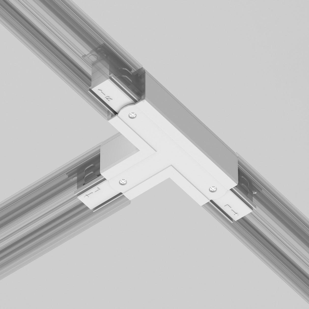 Close-up of the 3-Phase Surface-Mounted Track Trinity Left T-Shaped Connector - White, joining three aluminum rail sections. Ideal for modern decor like track lighting, it is secured with screws on a plain gray background to demonstrate structural assembly.