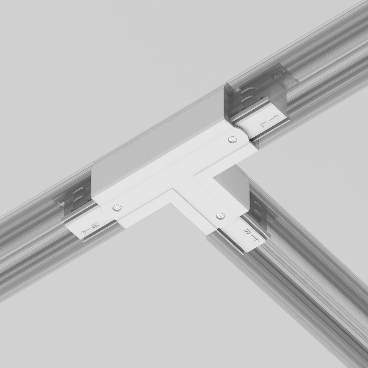 The 3-Phase Surface-Mounted Track Trinity Right T-Shaped Connector in white is showcased in a suspended ceiling system, joining metallic parts with screws. It seamlessly integrates into modern interiors, mounted on intersecting metal rails against a light gray background.