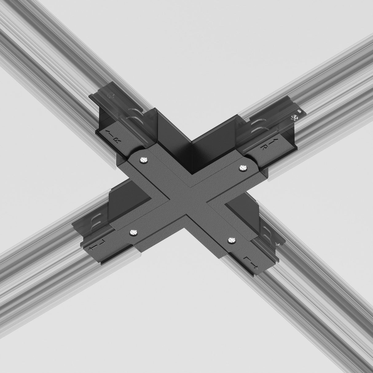 The 3-Phase Surface-Mounted Track Trinity X-Shaped Connector in black connects four silver rails into a grid, with visible screws ensuring stability. It rests against a plain, light background for versatile lighting configurations.