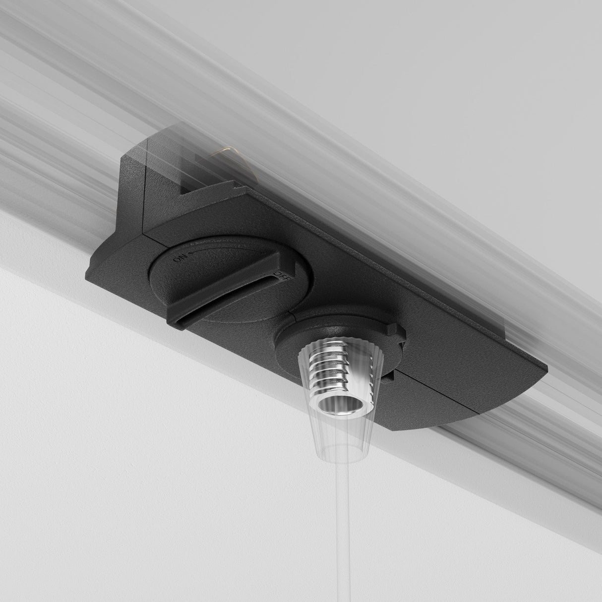 The Unity Single Phase Track Connector in black secures a transparent tube with a circular base and slotted mechanism, integrating modular lighting onto a flat, light-colored surface.