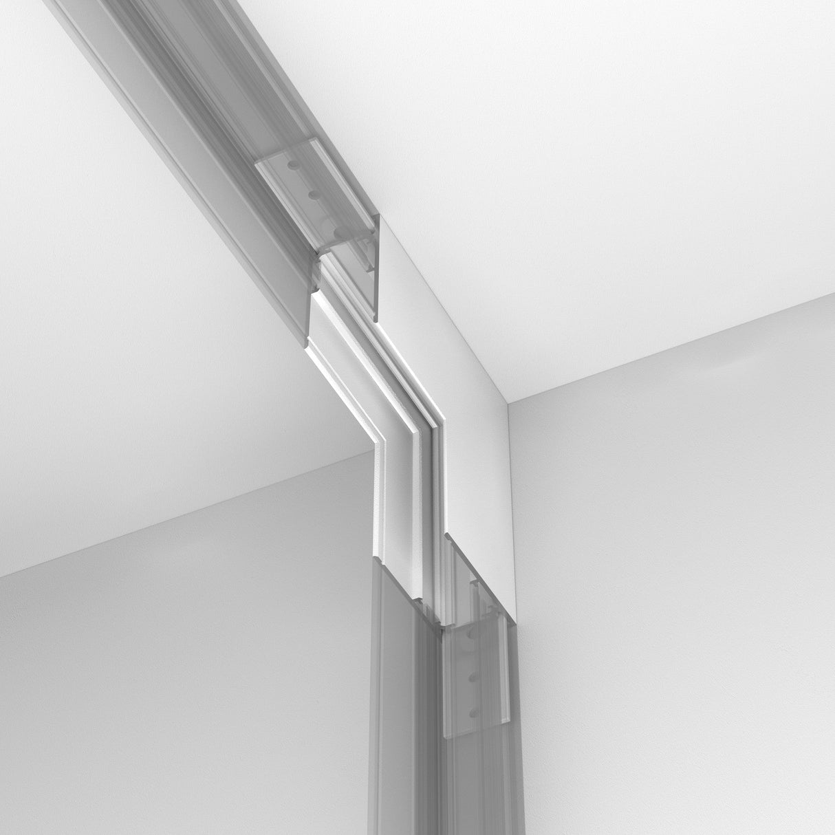 Close-up of a minimalistic door frame showcasing sleek, metal hinges in a white wall. The Exility Magnetic Surface-Mounted Track Internal Corner Connector - White highlights the smooth ceiling and walls painted in white, enhancing the contemporary design.