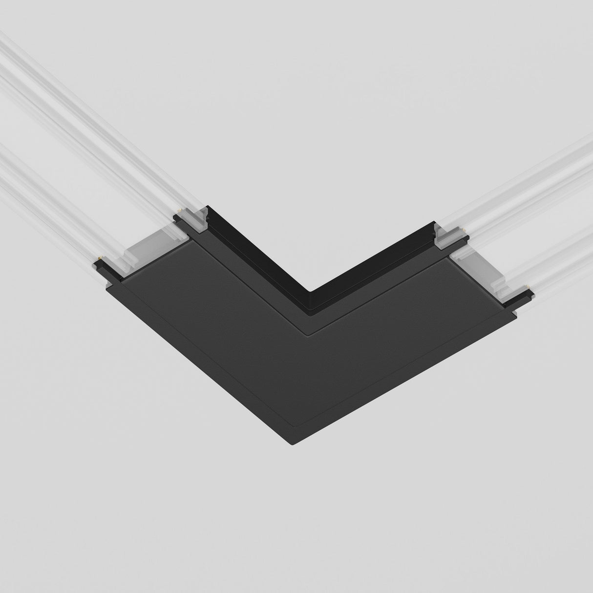 A close-up of the Radity Magnetic Track L-Shaped Power Connector in black seamlessly connects two white ceiling tracks, standing out against a plain white background.