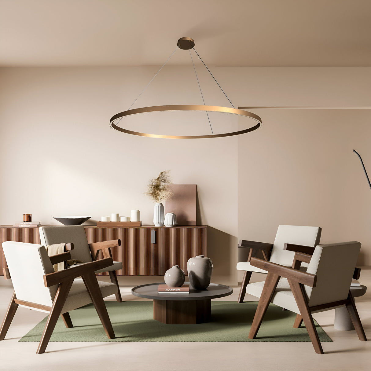 A modern living room showcases minimalist wooden furniture: four chairs, a round coffee table on a green rug, and features ambient lighting from the Rim LED Circular Suspension Light 120cm - Brass. A sideboard in the background displays decorative vases and candles for added charm.