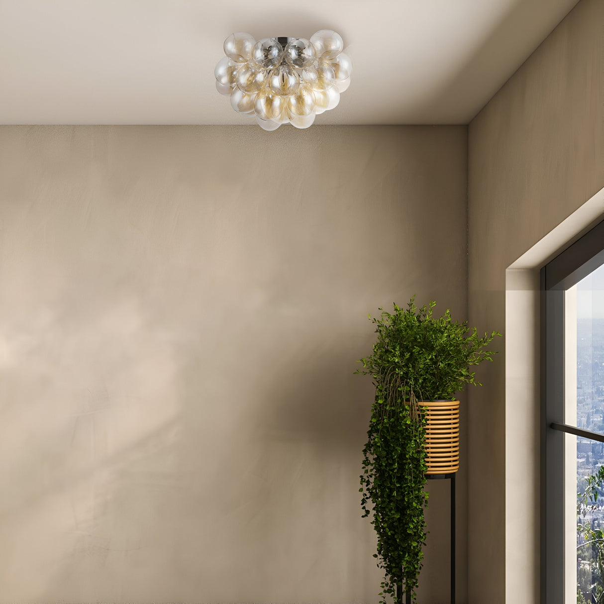 A modern room boasts the Balbo 8 Light Semi-Flush in Nickel with Cognac Glass, featuring clustered glass domes. A tall potted plant with cascading leaves stands by a large window, inviting natural light and complementing the sleek nickel finish of the contemporary lighting fixture.