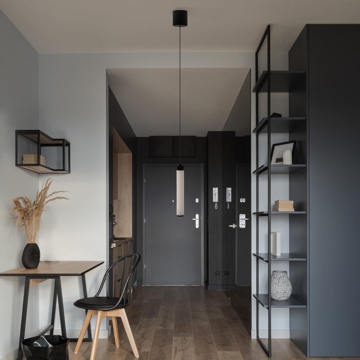 Interior view of Ray LED short pendant light, adding a bold black and white design to the decor.