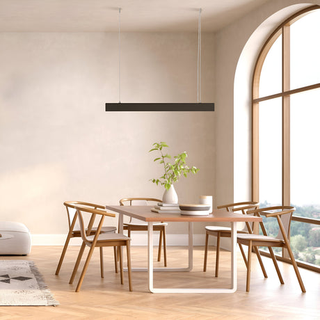 A modern dining room showcases a wooden table with four chairs on a herringbone-patterned floor. A potted plant sits on the table, as natural light streams through an arched window, highlighting the Points LED Linear Suspension Light - Black with adjustable height.