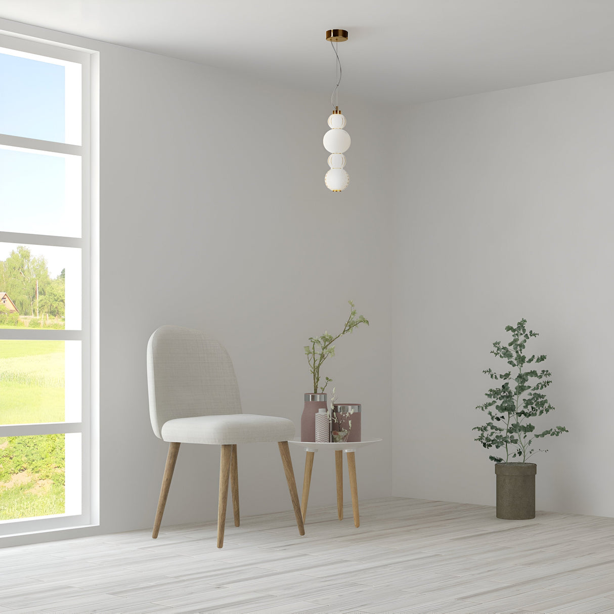 A minimalist room includes a gray chair and a small white round table decorated with plants and brown vases. A green plant sits in a pot on the floor. The Collar LED Pendant Light 17W - Gold elegantly hangs from the ceiling, while a large window displays outdoor greenery.