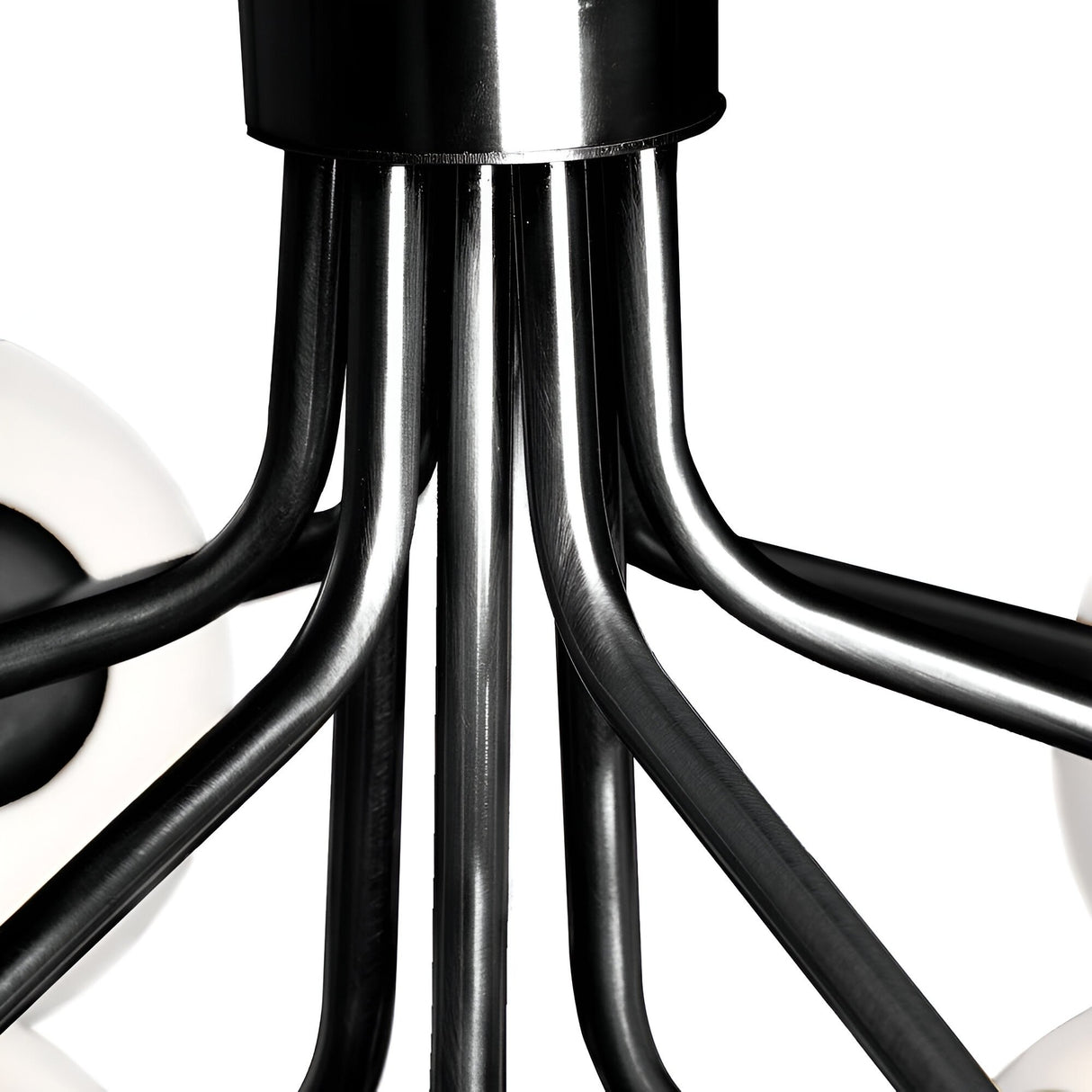 Close-up of the Ivy 9 Light Chandelier - Black, featuring black metal arms extending from a central cylinder with two opal glass shades partially visible on either side against a white background.