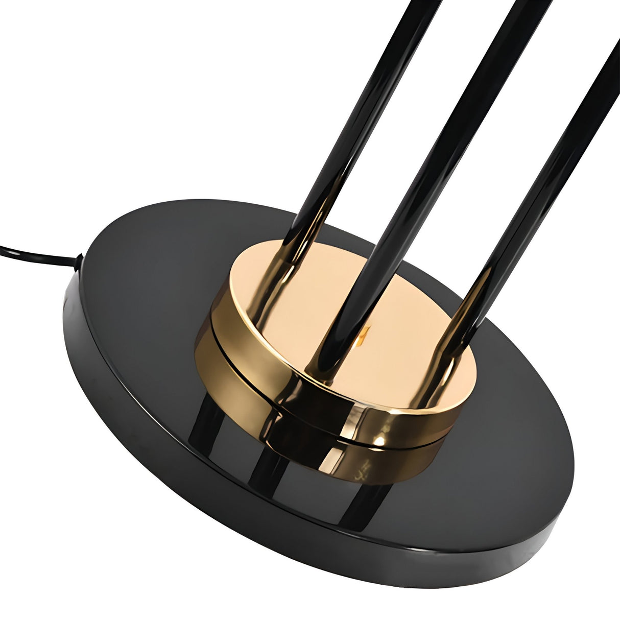 Close-up of the Leonard 3 LED Floor Lamp - Black & Gold, showcasing a shiny black and gold circular base, three vertical glossy rods, a central gold accent, and an energy-efficient black electrical cord extending from the base.
