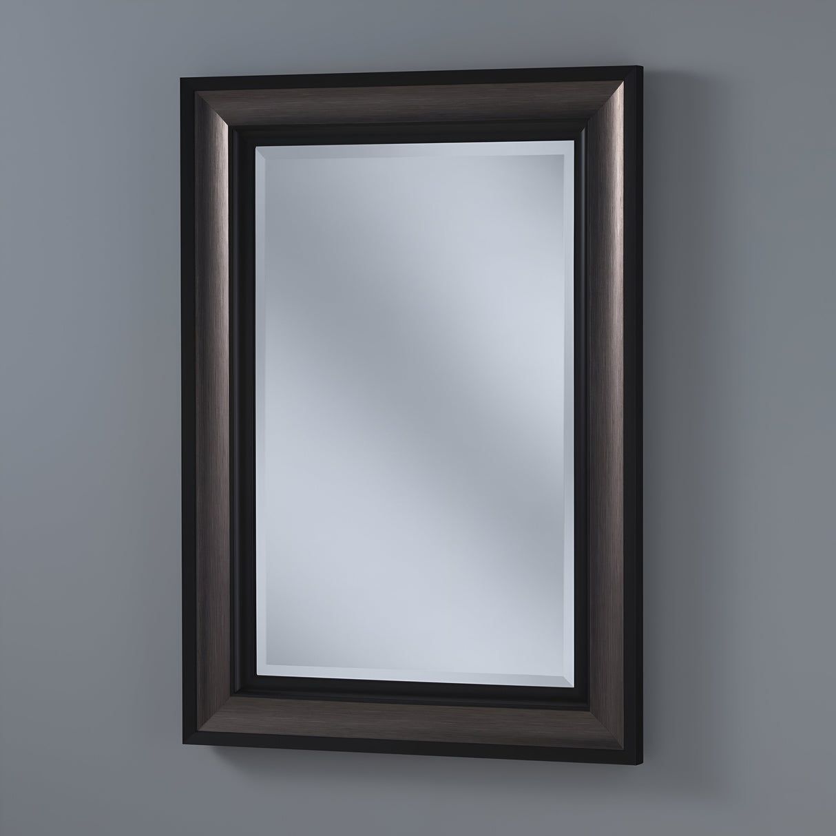 The Mystaria Rectangle Wall Mirror - Black & Grey, featuring a dark frame and sleek beveled design, is set against a gray wall. Its modern look enhances the contemporary feel of the space, subtly reflecting light in modern interiors.