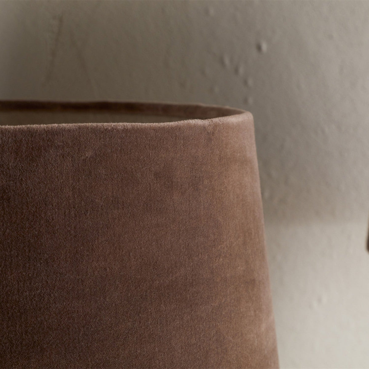 Close-up of the Mendai Large Velvet & Linen Lampshade in mocha, showing a tapered drum shape with a pale natural linen lining visible at the top rim.