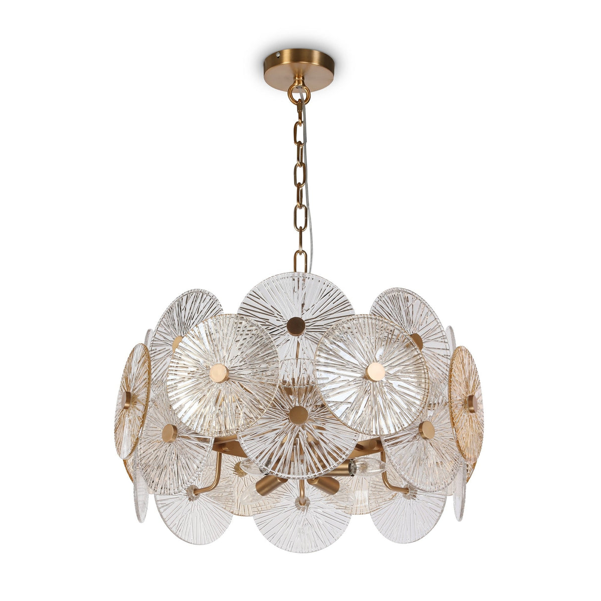 The Aster 8 Light Chandelier in gold has a round base adorned with circular, stamped glass spheres in starburst patterns. It hangs from a linked chain, highlighting modern aesthetics and artistic design.