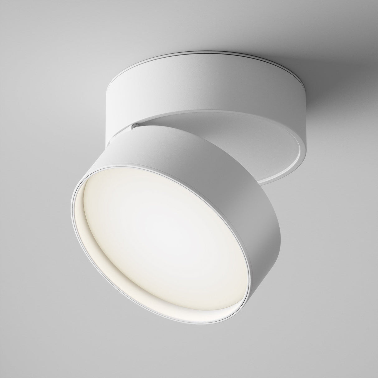 The Onda LED Single Spotlight 18W 4000K in white is a modern, ceiling-mounted fixture. It features a circular base and adjustable head, with a sleek finish that emits a soft 4000K glow for versatile illumination.