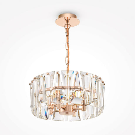 The Puntes 4 Light Chandelier - Gold is a luxurious, compact fixture with crystal-like geometric designs around a metallic frame, hanging from a matching chain and circular mount. It features multiple bulbs arranged in a circle.
