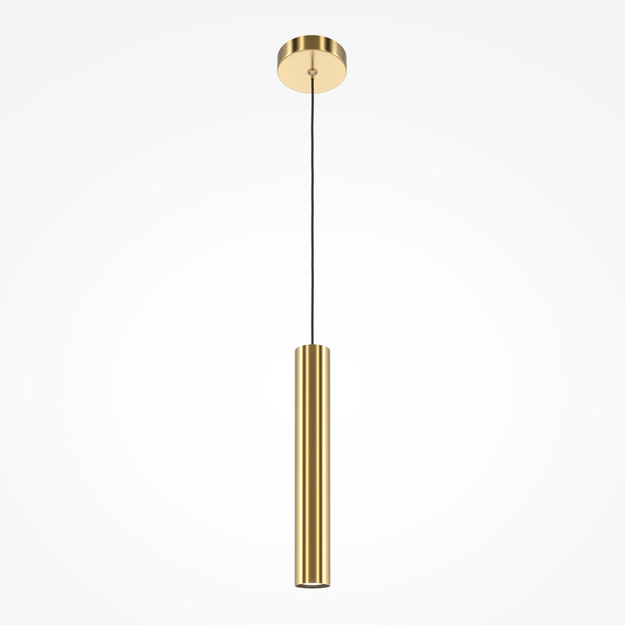 The Pro Focus Thin Pendant Light - Brass features a modern cylindrical gold fixture and a sleek design. Hanging from a black cord with a matching gold ceiling mount, its ideal for minimalist interiors, offering elegant ambient lighting against plain white backdrops.