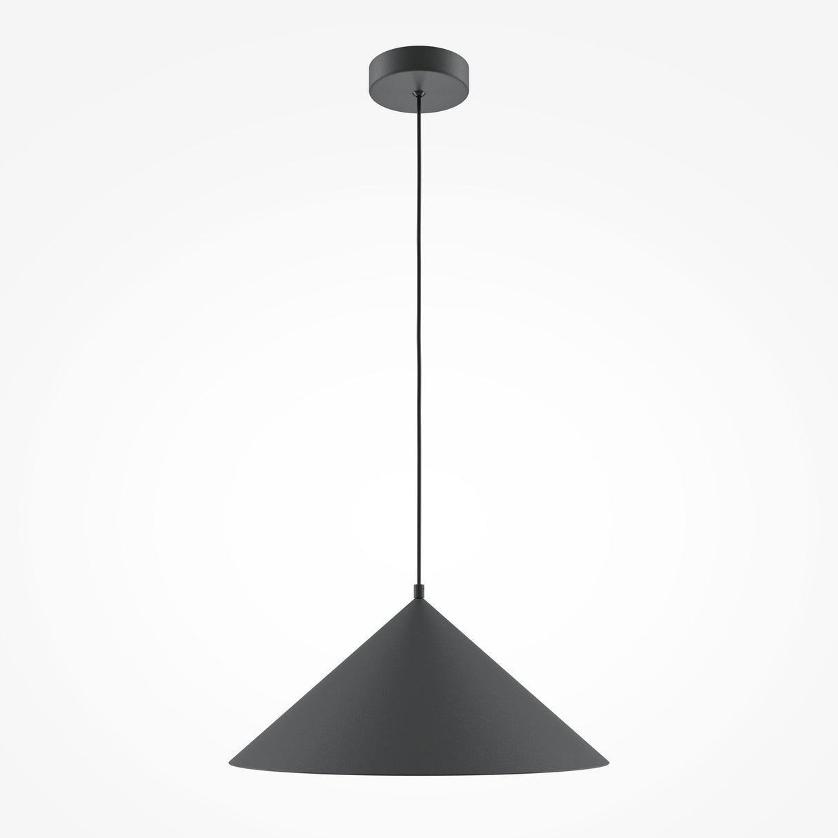 A Basic Colors Cone Pendant Light - Black, featuring a minimalist dark gray cone, hangs from a thin black cord attached to the ceiling. Its modern design offers beautiful contrast against a plain white background.