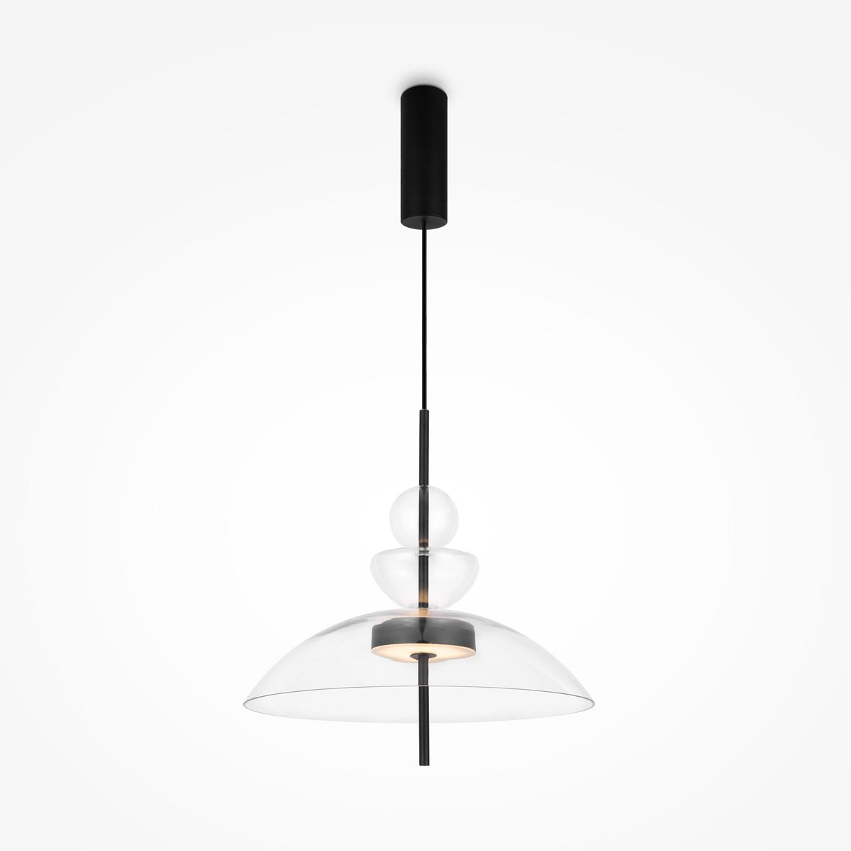 The Bangkok LED Pendant Light 40cm features a black rod with three stacked transparent glass shades of different sizes. The largest shade covers the light, providing a soft glow. Its sleek design includes a matte black ceiling mount and rod.