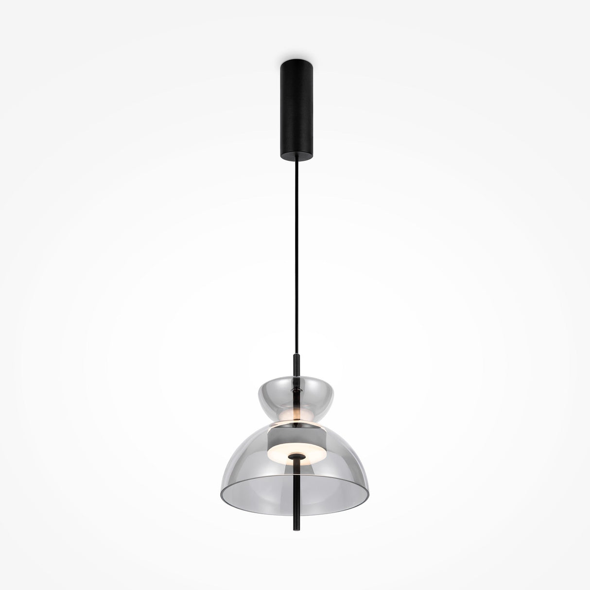 The Bangkok LED Pendant Light 25cm features a sleek black metal fixture and smoky bell-shaped glass shade, with a central bulb suspended from a slim black cord attached to a cylindrical ceiling mount.