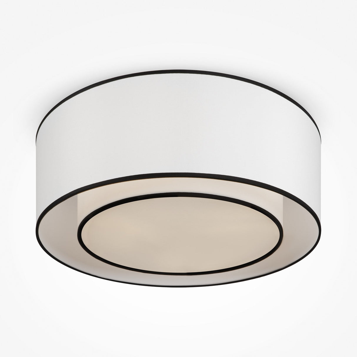 The Bergamo 3 Light Flush is a modern cylindrical lamp with a sleek white exterior and two concentric black rings near the bottom edge, providing a simple yet elegant look. It diffuses soft, even light, making it perfect as a contemporary ceiling fixture.