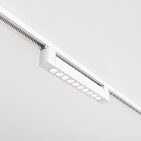 The Points Rot LED Swivel Linear Track Light offers a sleek, modern design. It features a 10W bulb with 4000K light temperature and a high CRI, mounted on a white ceiling to complement the rooms contemporary style seamlessly.