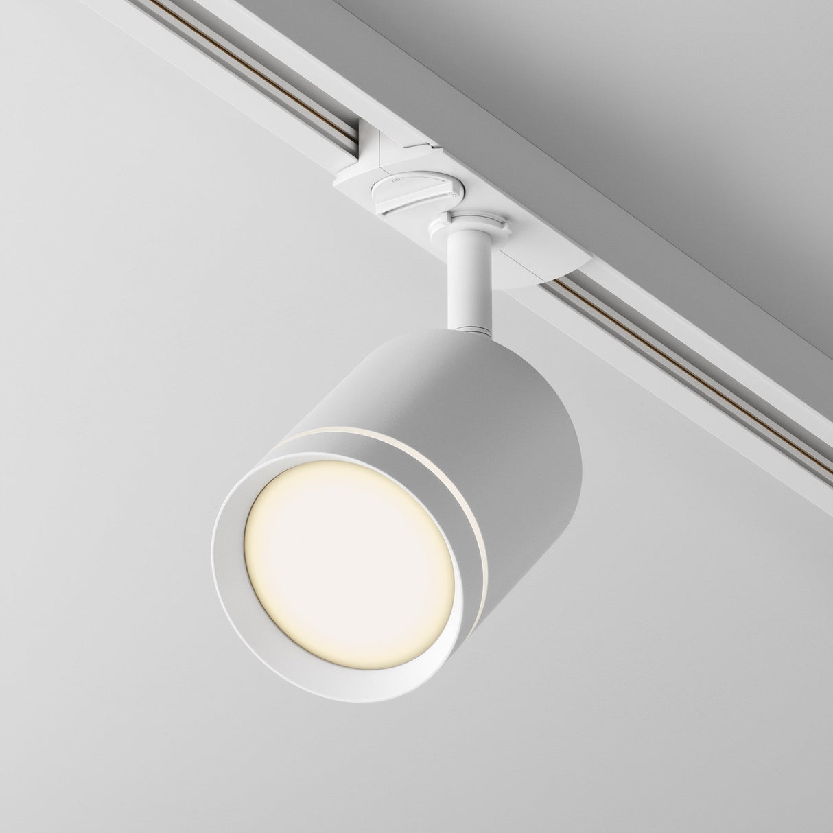 Orlo LED Single Phase Unity Track Spotlight in White, designed for single-phase track systems with a clean white finish, offering directional lighting.