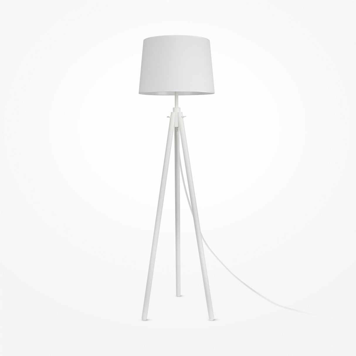 The Calvin Floor Lamp - White With Natural Wood Tripod showcases a minimalist design with a natural wood base and white cotton cylindrical shade. A sleek white power cord extends from the base, set against a plain white background.