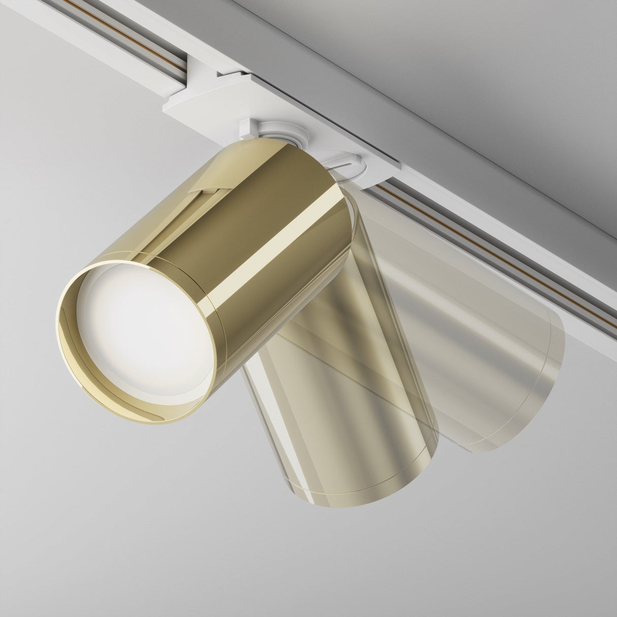 Control and mobility features of Focus S single phase Unity track spotlight in white and gold, ideal for flexible lighting setups.