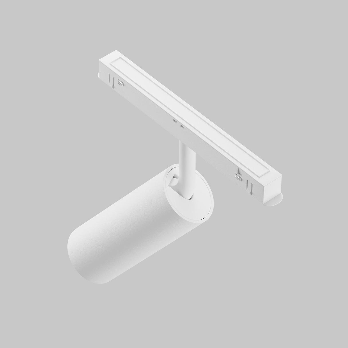 The Focus LED Magnetic Exility Track Spotlight 12W 4000K - White is shown against a light gray background. This cylindrical fixture on a linear track provides natural white light and features a modern, minimalist design with a high color rendering index for optimal illumination.
