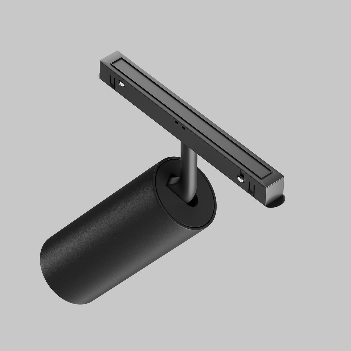 Mounted on a linear fixture against a gray background, the Focus LED Magnetic Exility Track Spotlight 20W 3000K in black illuminates spaces with exceptional clarity and vibrancy, thanks to its high color rendering index and modern, minimalistic design.